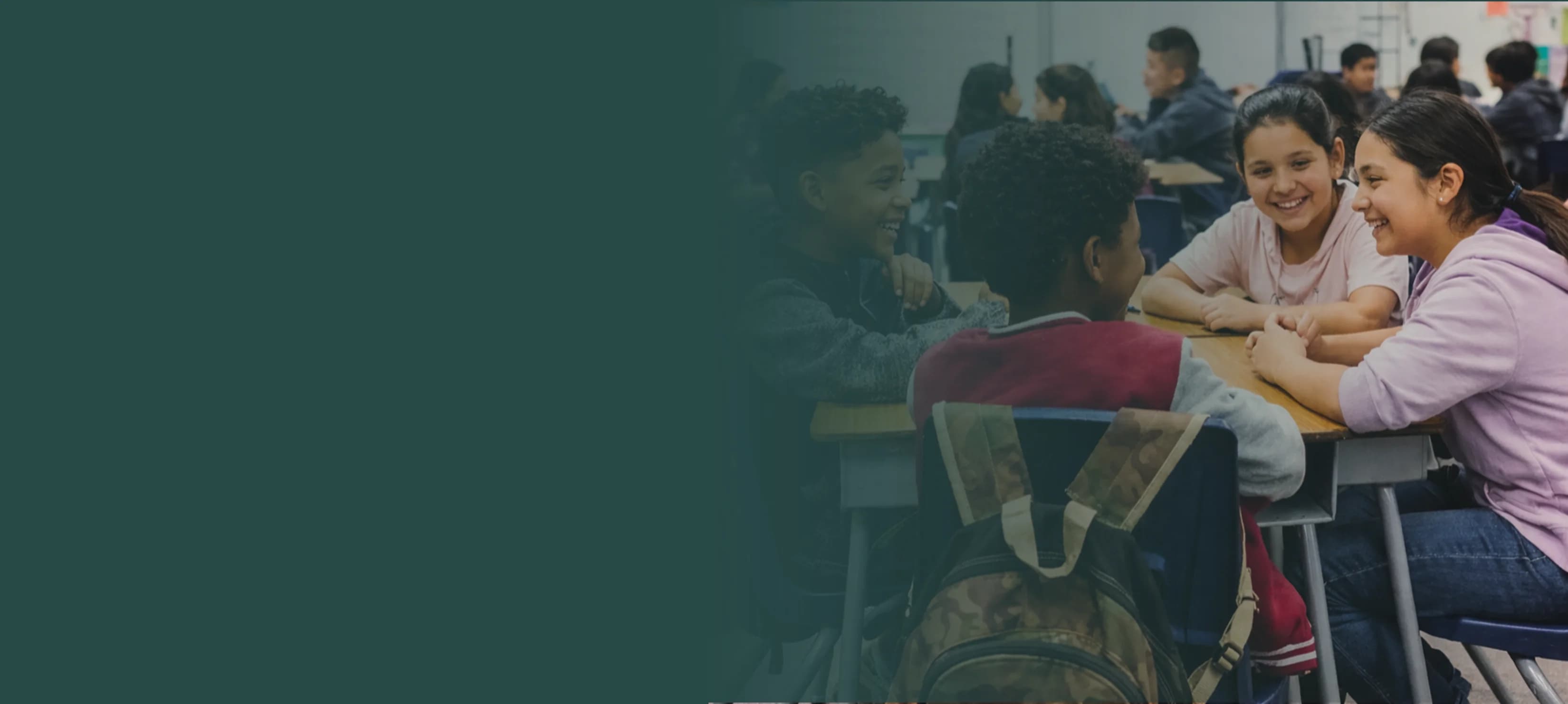 Students talking in a classroom